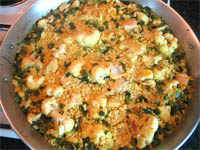 Paella de col y bacalao